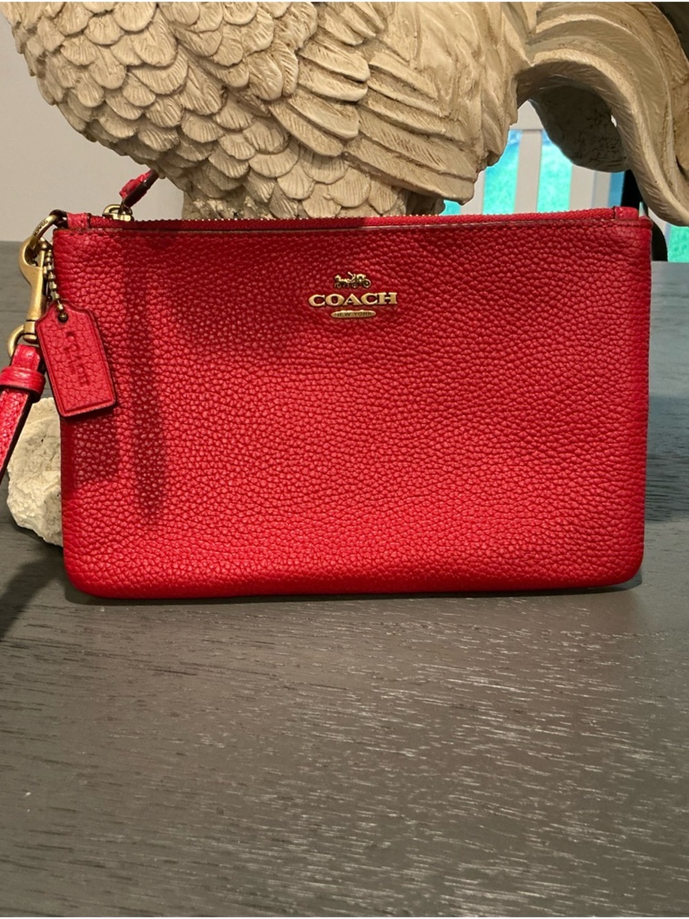 Coach Red Pebbled Leather Wristlet Clutch with Gold Hardware
7 1/2 x 5